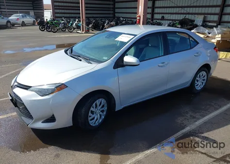 2017 Toyota Corolla Le z USA, uszkodzony, nr VIN 5YFBURHE9HP737863